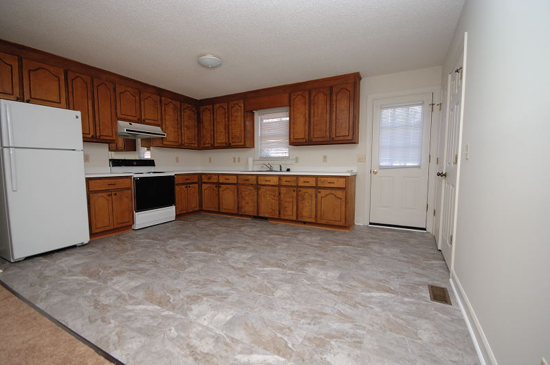 Goldsboro NC - Homes for Rent - 201 North Goldsboro Street Apartment 1 Pikeville NC 27863 - Kitchen / Dining Area